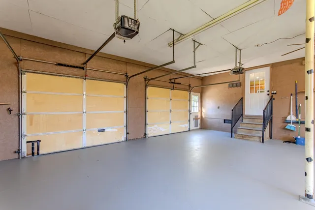 a view of a room with wooden walls