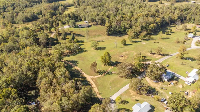 a view of a big yard with an outdoor space