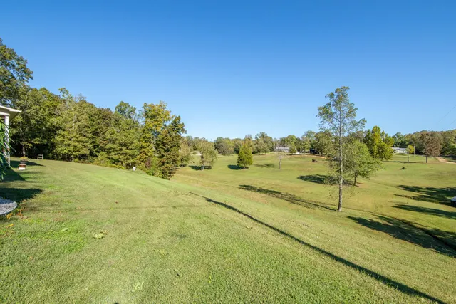 a view of a balcony with furniture