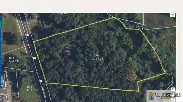 a view of a house with a big yard