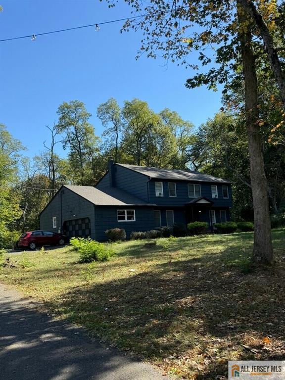 123 Applegarth Road Monroe Township, NJ 08831 - Photo 2 of 3 a view of a house with a big yard
