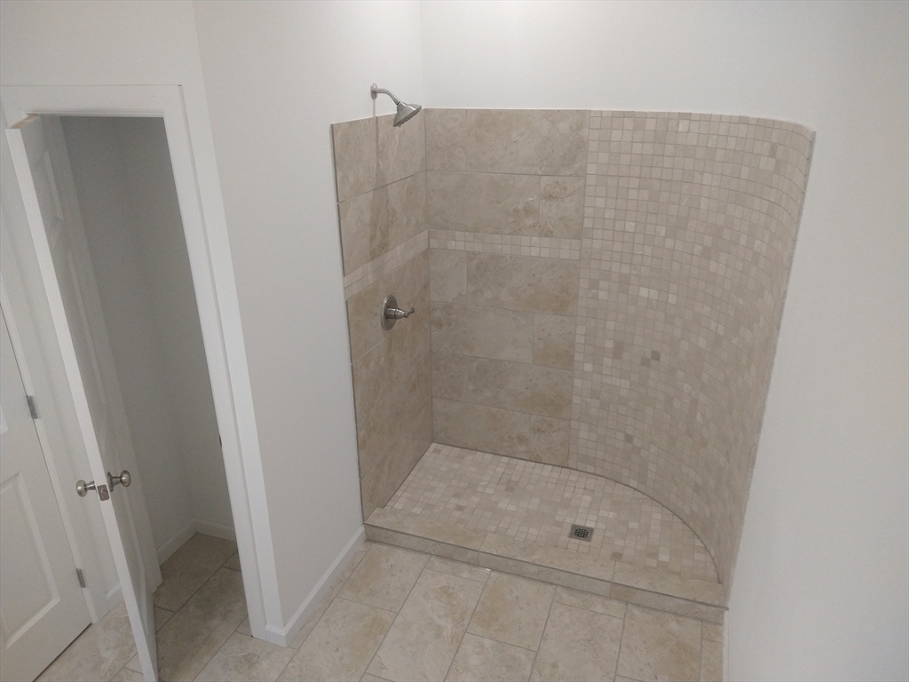 26 Russell Street, Unit AB Hadley, MA 01035 - Photo 23 of 42 a bathroom with a shower