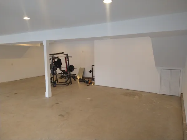 a bathroom with a sink toilet and mirror