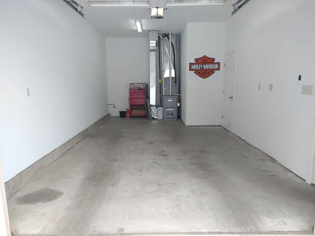 a kitchen with stainless steel appliances granite countertop a refrigerator stove and sink