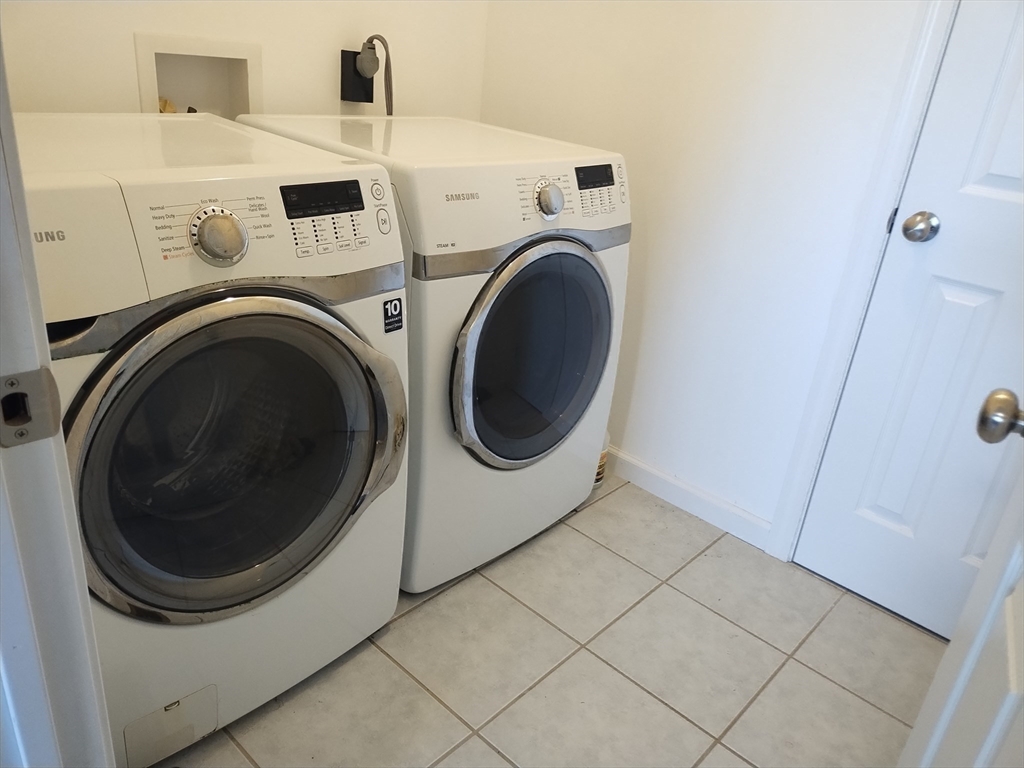 26 Russell Street, Unit AB Hadley, MA 01035 - Photo 34 of 42 a utility room with dryer and washer