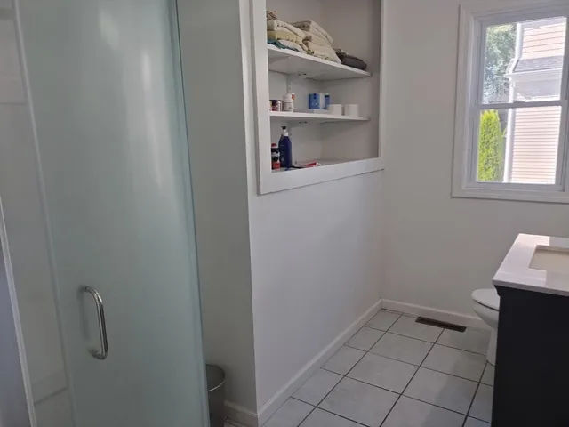 a view of a road with trees in front of it