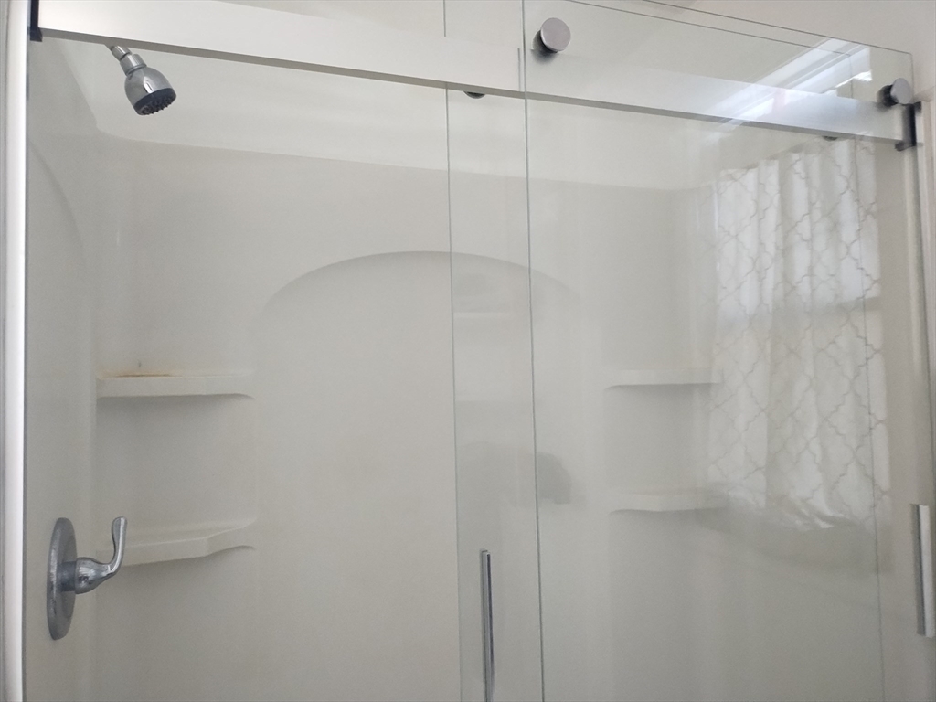 26 Russell Street, Unit AB Hadley, MA 01035 - Photo 39 of 42 a bathroom with a shower