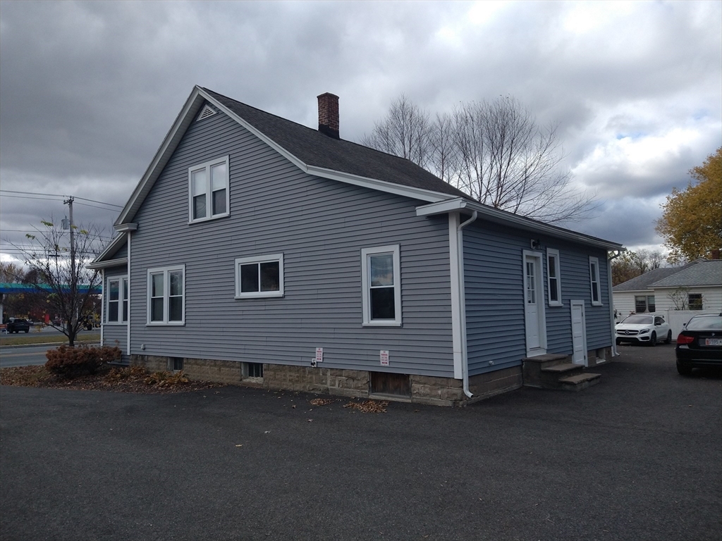 26 Russell Street, Unit AB Hadley, MA 01035 - Photo 7 of 42 a front view of a house with a street