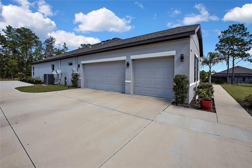 9504 Earthwind Court Weeki Wachee, FL 34613 - Photo 44 of 48 a house view with a outdoor space