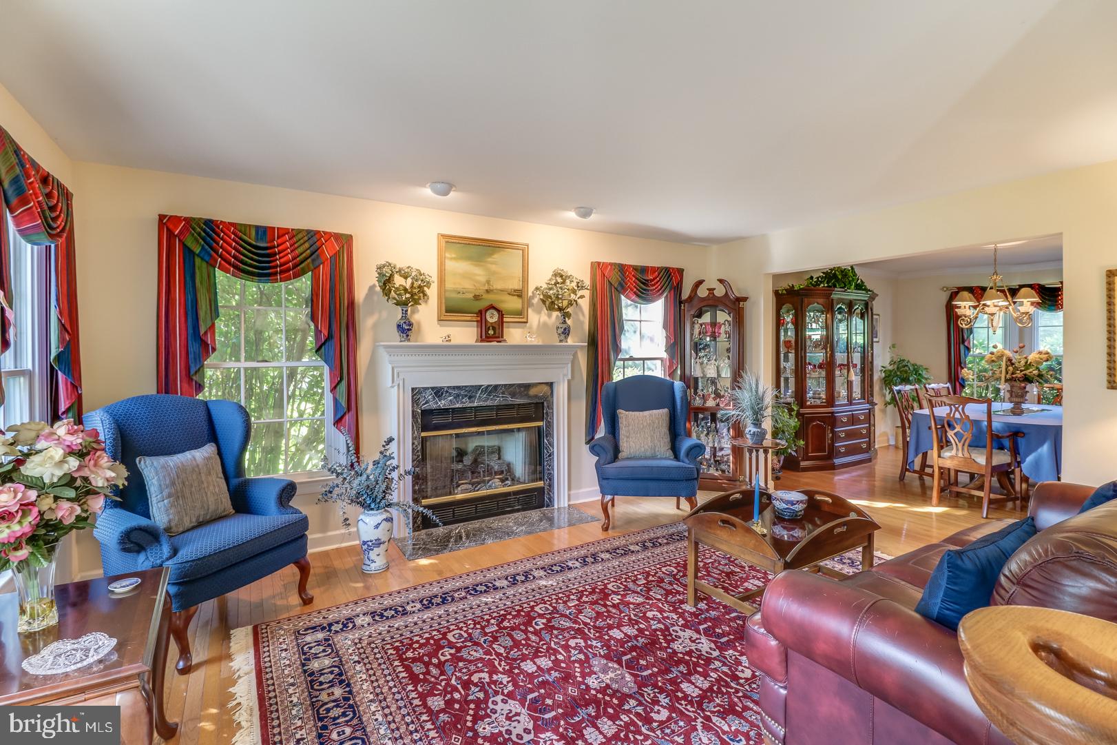 199 West Pebworth Road Magnolia, DE 19962 - Photo 7 of 43 Living Room with wood floors and gas fireplace