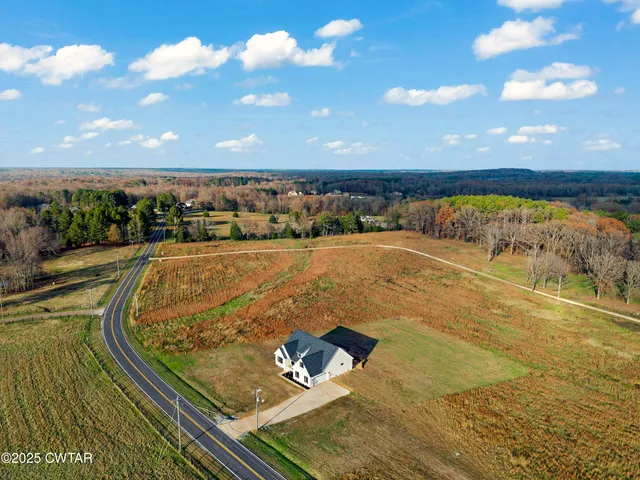 a view of a swimming pool with an outdoor seating