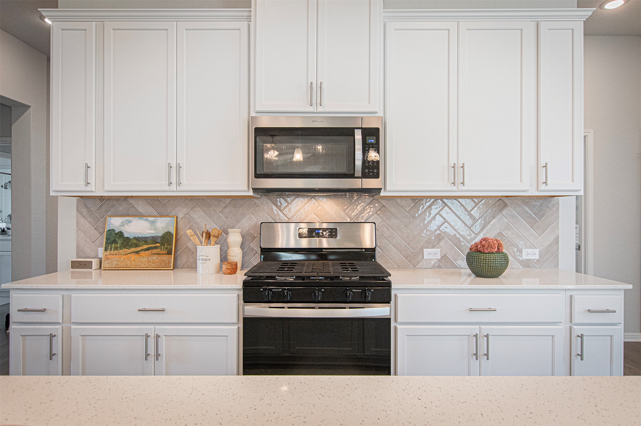 249 Treadwell Lane Kyle, TX 78640 - Photo 11 of 26 a kitchen with cabinets and appliances