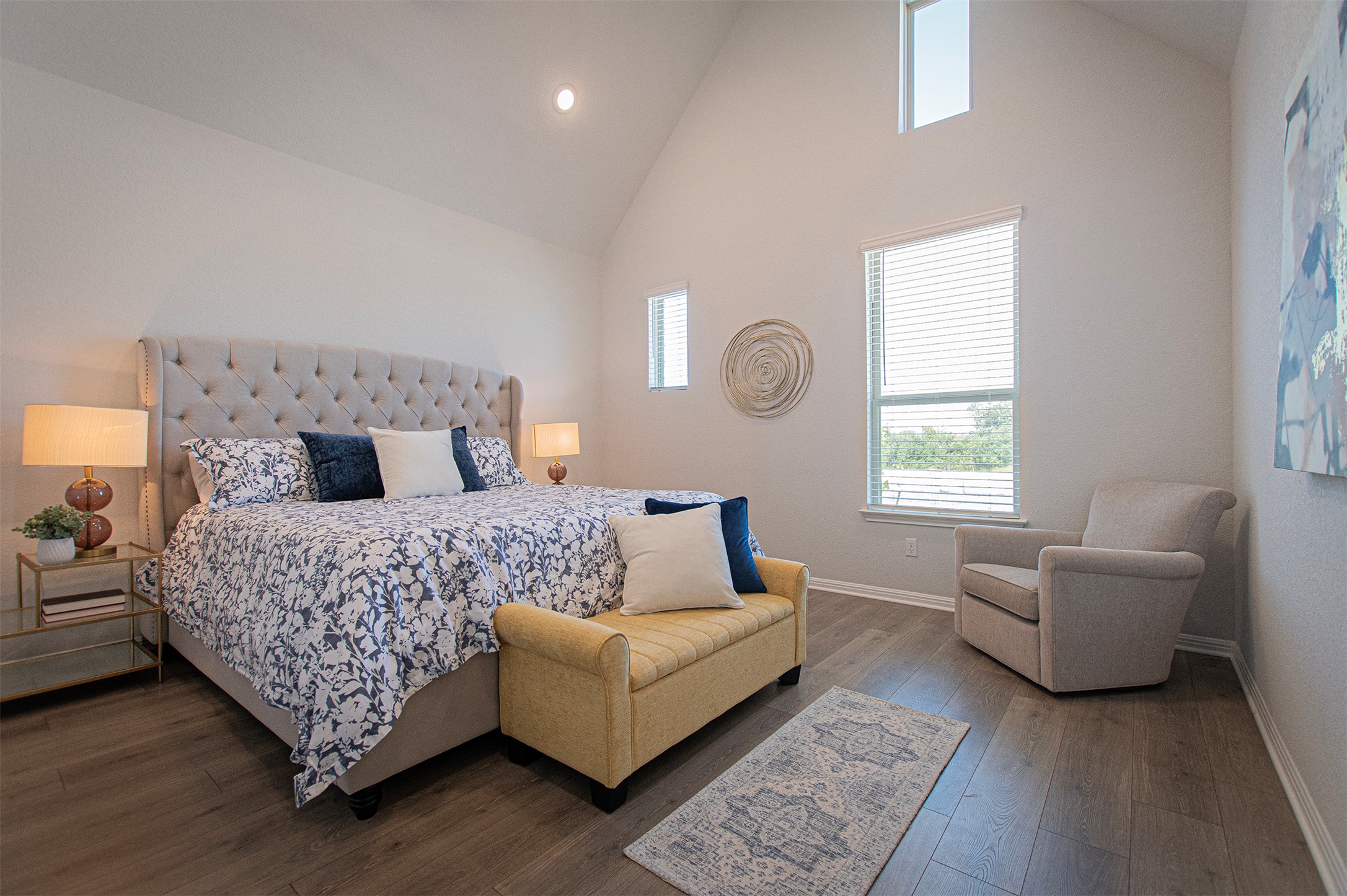 249 Treadwell Lane Kyle, TX 78640 - Photo 15 of 26 a bedroom with a large bed and a couch