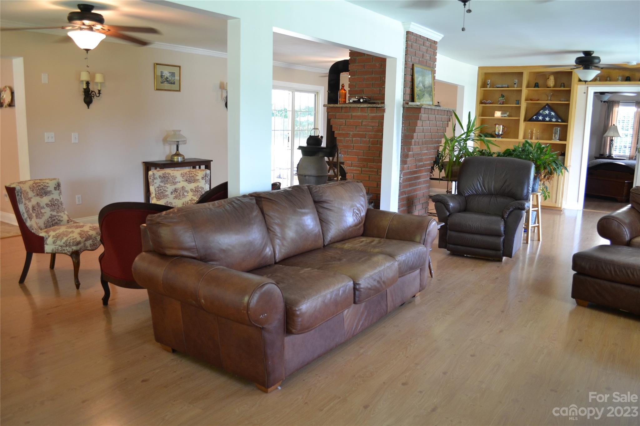 109 Tucker Street Locust, NC 28097 - Photo 6 of 13 a living room with furniture and a flat screen tv