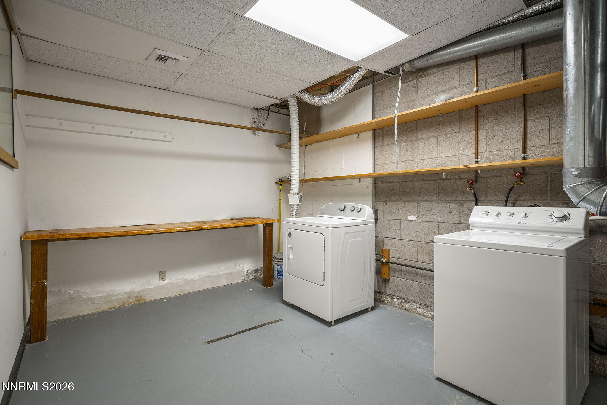 2985 Socrates Drive Reno, NV 89512 - Photo 35 of 52 a utility room with dryer and washer
