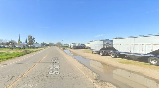 a view of a lake with a big yard