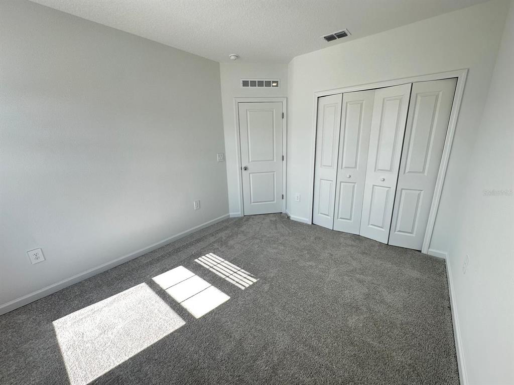 2713 Skyline Loop Kissimmee, FL 34758 - Photo 14 of 20 a view of an empty room