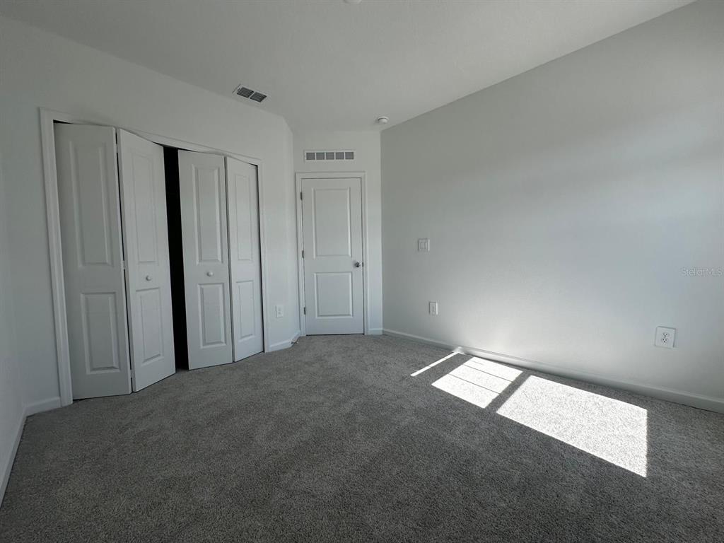 2713 Skyline Loop Kissimmee, FL 34758 - Photo 17 of 20 a view of an empty room
