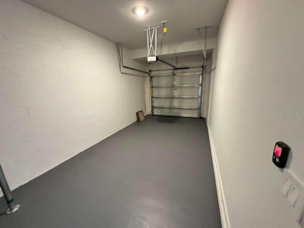 2713 Skyline Loop Kissimmee, FL 34758 - Photo 19 of 20 an empty room with a ceiling fan