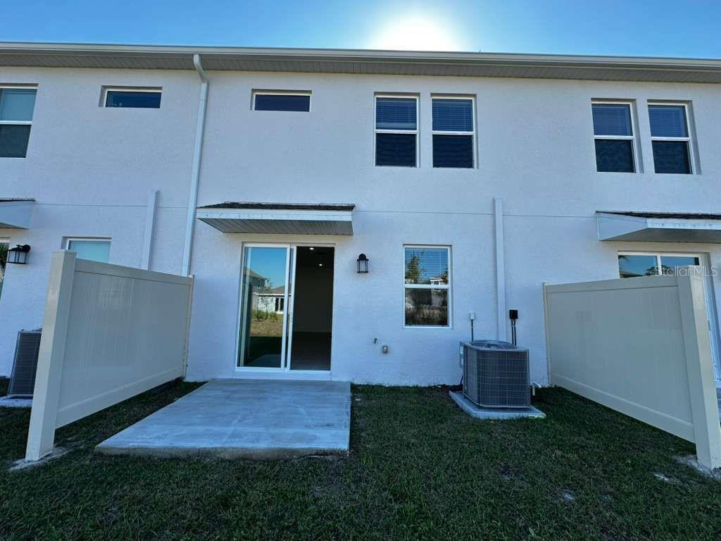 2713 Skyline Loop Kissimmee, FL 34758 - Photo 20 of 20 a view of outdoor space and yard