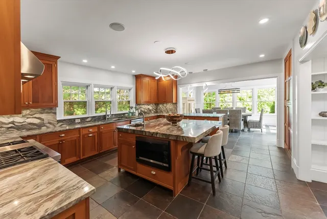 a kitchen with a stove and a sink