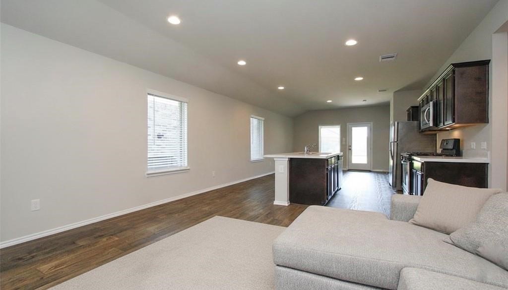 2354 Otter Falls Drive Spring, TX 77373 - Photo 4 of 9 a living room with furniture and a window