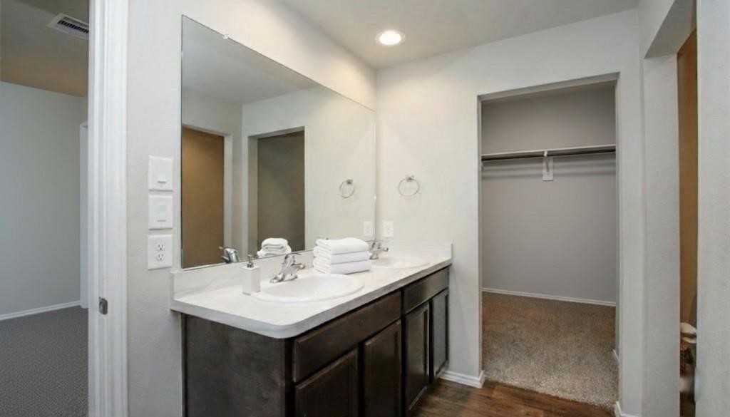 2354 Otter Falls Drive Spring, TX 77373 - Photo 8 of 9 a bathroom with a sink and a mirror