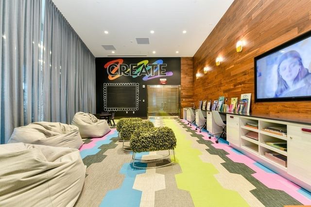 a view of a city with tall buildings