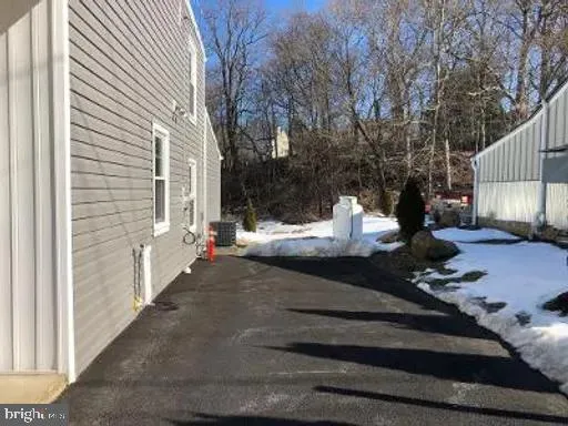a view of a town with barn house