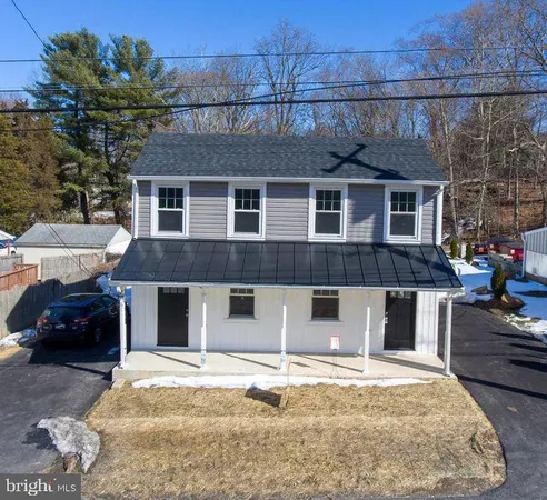 a view of a street with cars