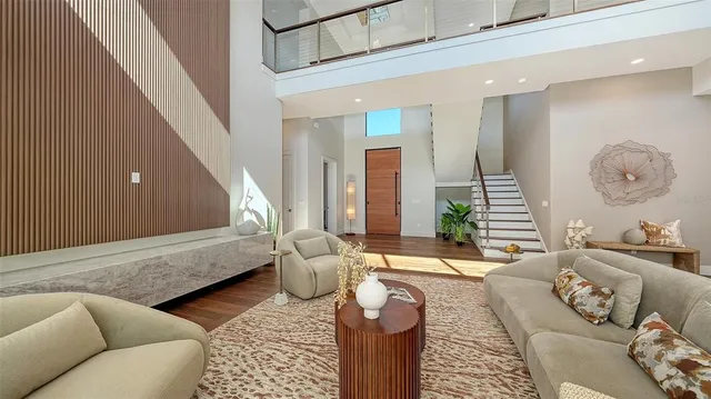 a kitchen with a sink a table and chairs