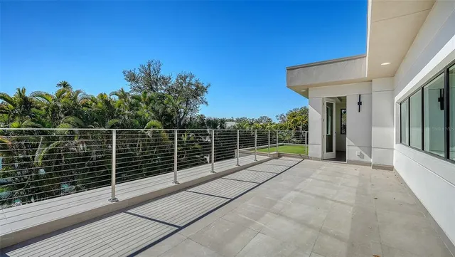 a kitchen with a table chairs and stove