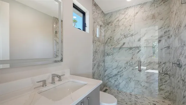 a view of backyard with swimming pool and outdoor seating