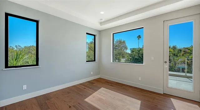 a view of swimming pool with outdoor seating and plants