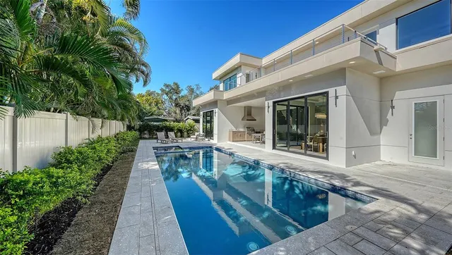 a sign that is on a pole on a street