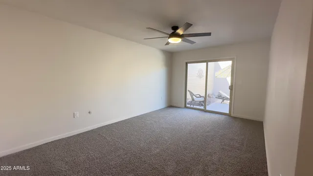 a dining room with furniture and a table