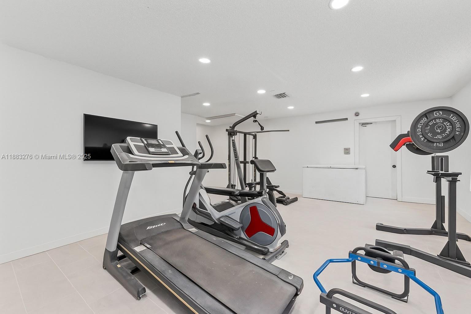 14401 Southwest 23rd Street Davie, FL 33325 - Photo 12 of 56 a view of a room with gym equipment