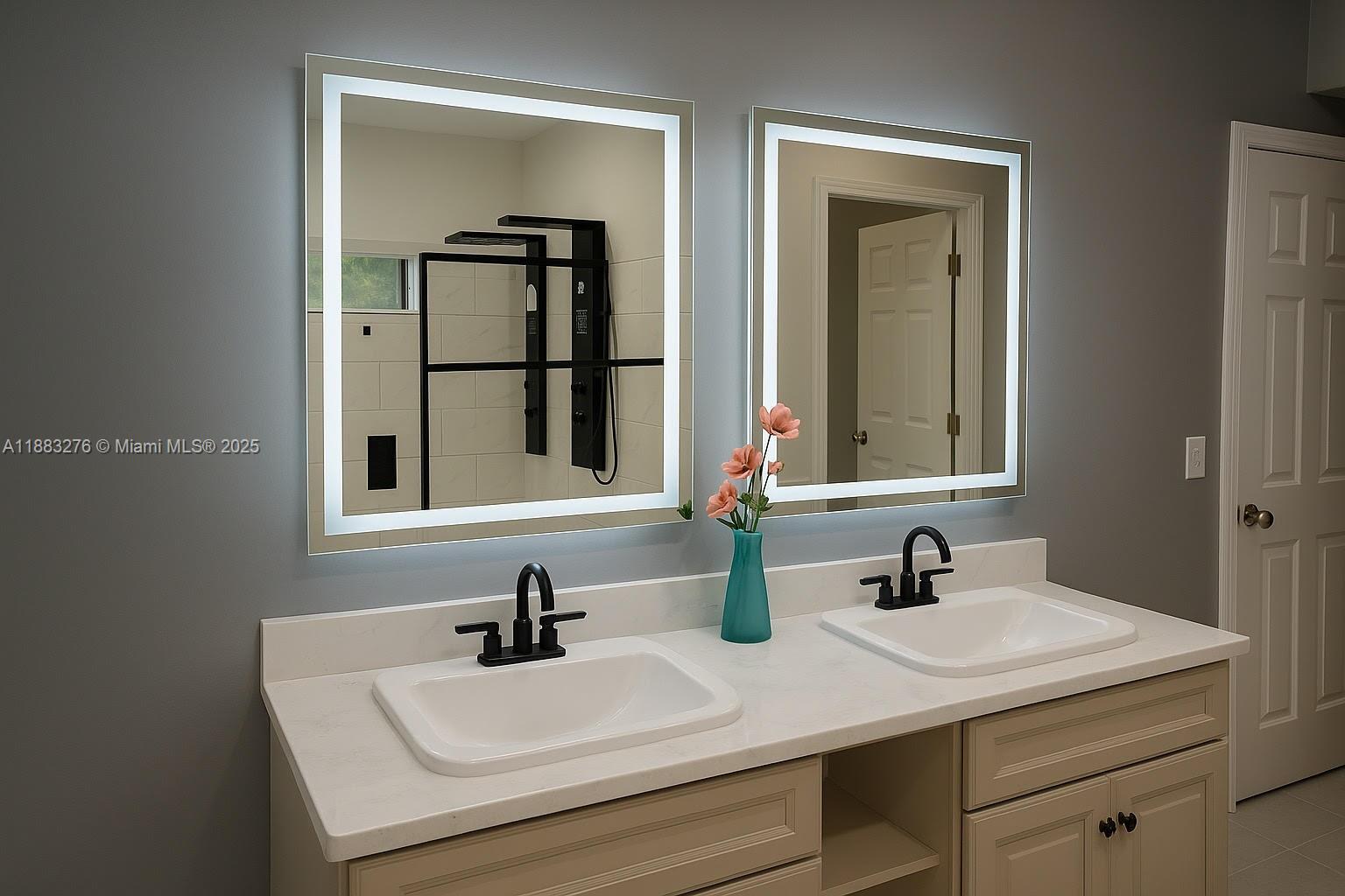 14401 Southwest 23rd Street Davie, FL 33325 - Photo 24 of 56 a bathroom with a sink and a mirror