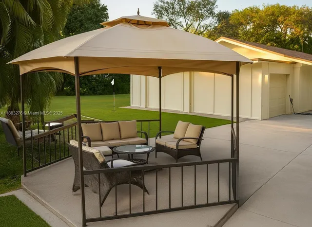 a bathroom with a tub and shower