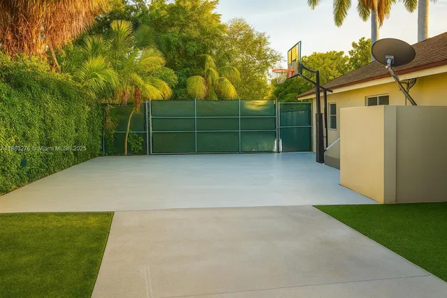 a bathroom with a tub and shower