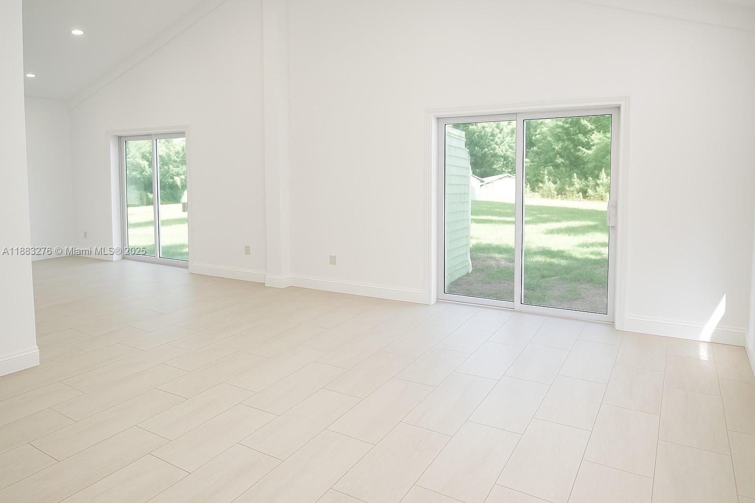 14401 Southwest 23rd Street Davie, FL 33325 - Photo 49 of 56 an empty room with windows