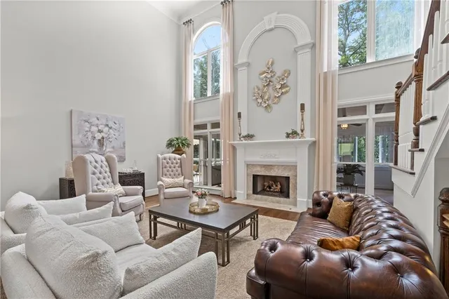 a view of a chair and table on the wooden floor
