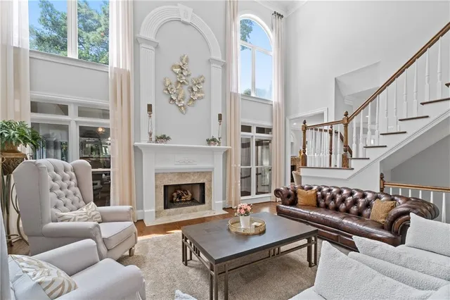 a view of balcony with furniture and umbrella
