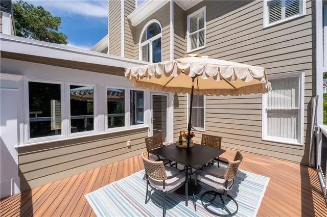 a view of an empty room with a fireplace