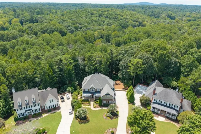 a view of an entryway with wooden floor and stairs
