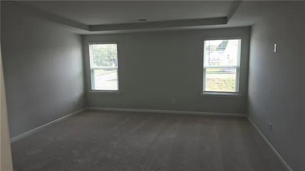 a bathroom with a glass door shower