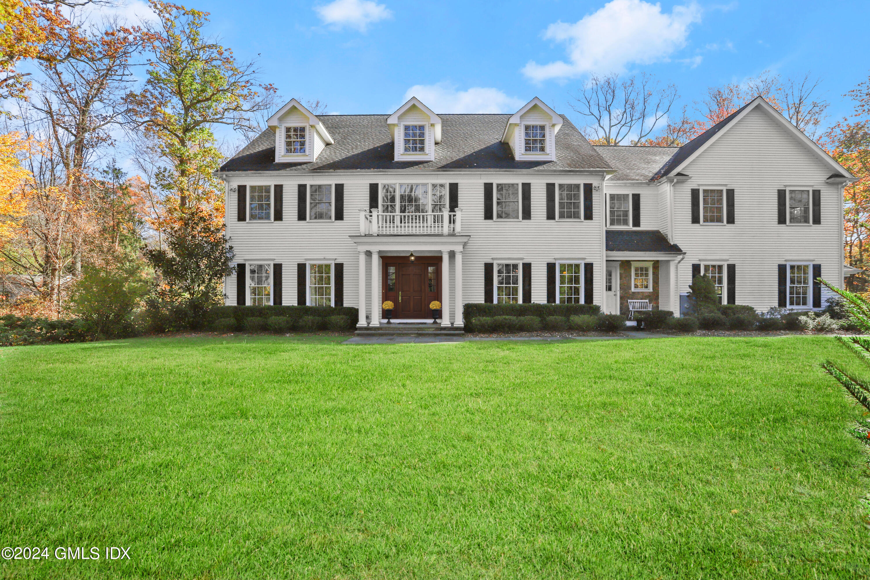 25 Birch Lane Greenwich, CT 06830 - Photo 1 of 1 a view of a house with a yard