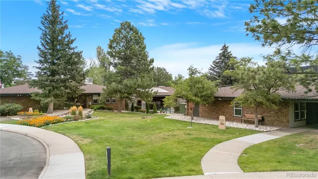 a view of a park with plants and trees