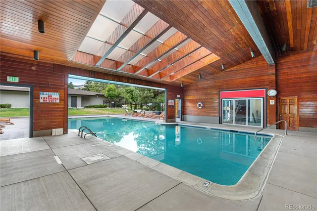 a view of a swimming pool with a patio