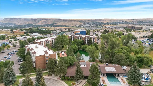 an aerial view of a house with a garden